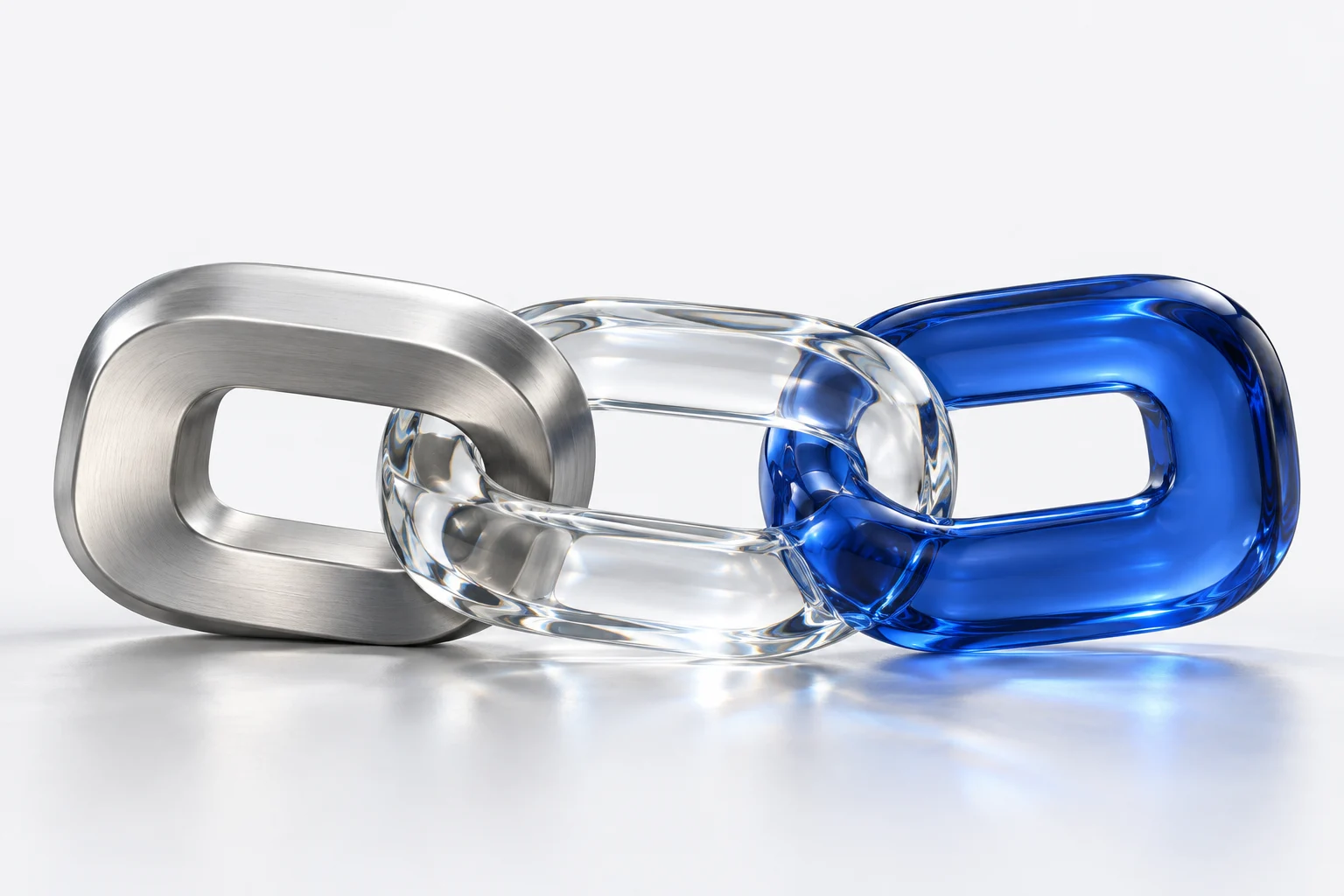 Three interlocking links in satin aluminum, clear glass and cobalt blue glass, symbolizing the connection between website data and AI.